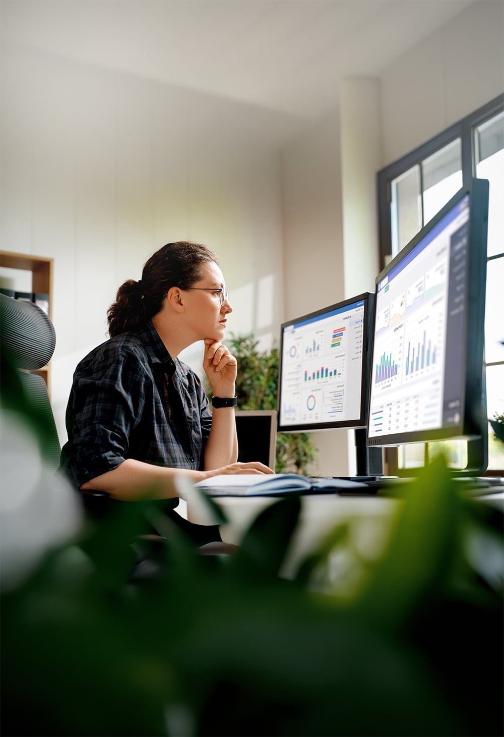 professional-woman-focused-on-data-analysis-at-her-2026-10-08-16-22-07-utc copy